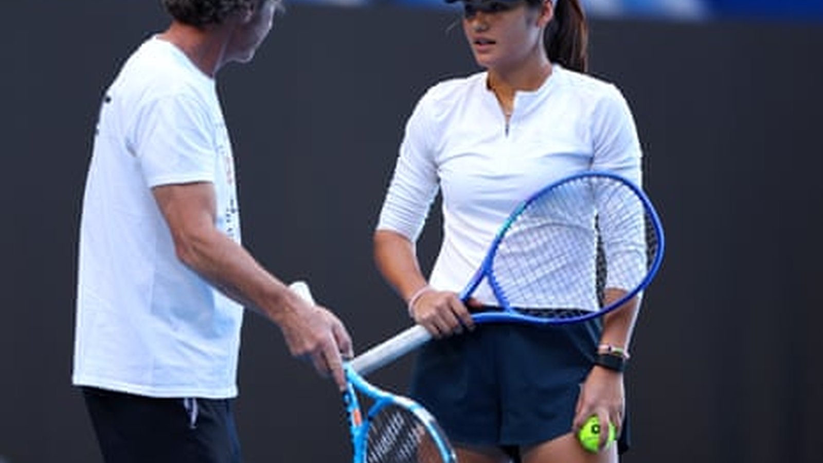 Emma Raducanu on a tennis court