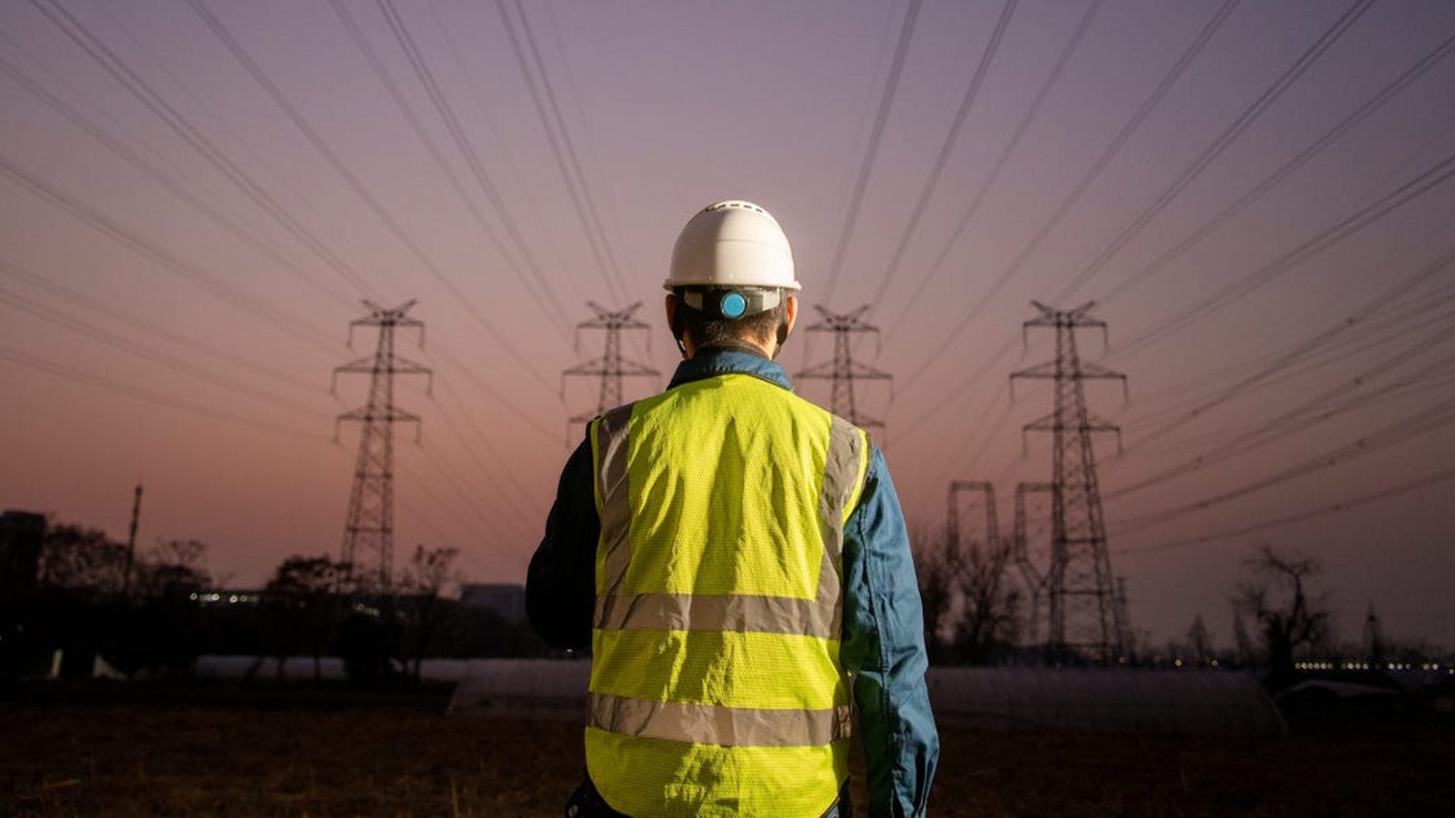 Electricity transmission lines against sky