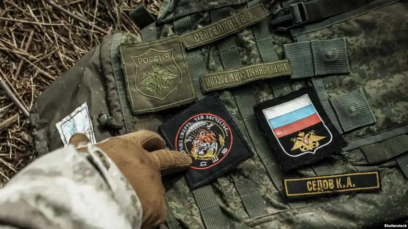 Ukrainian soldier observing battlefield
