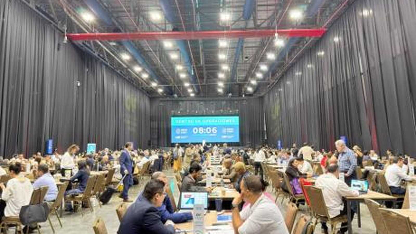 Business leaders networking at an economic forum