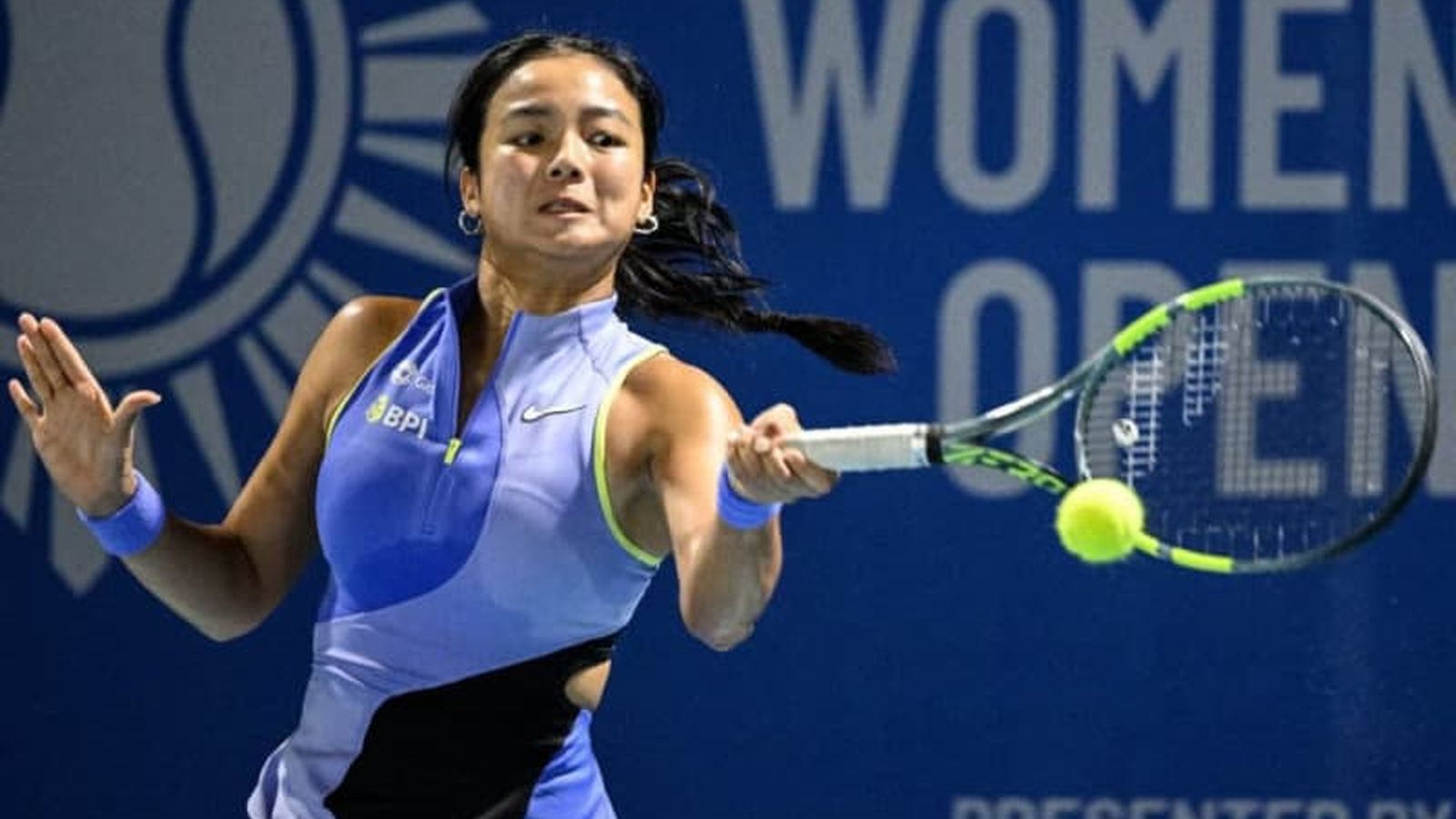 Emma Raducanu serving during match