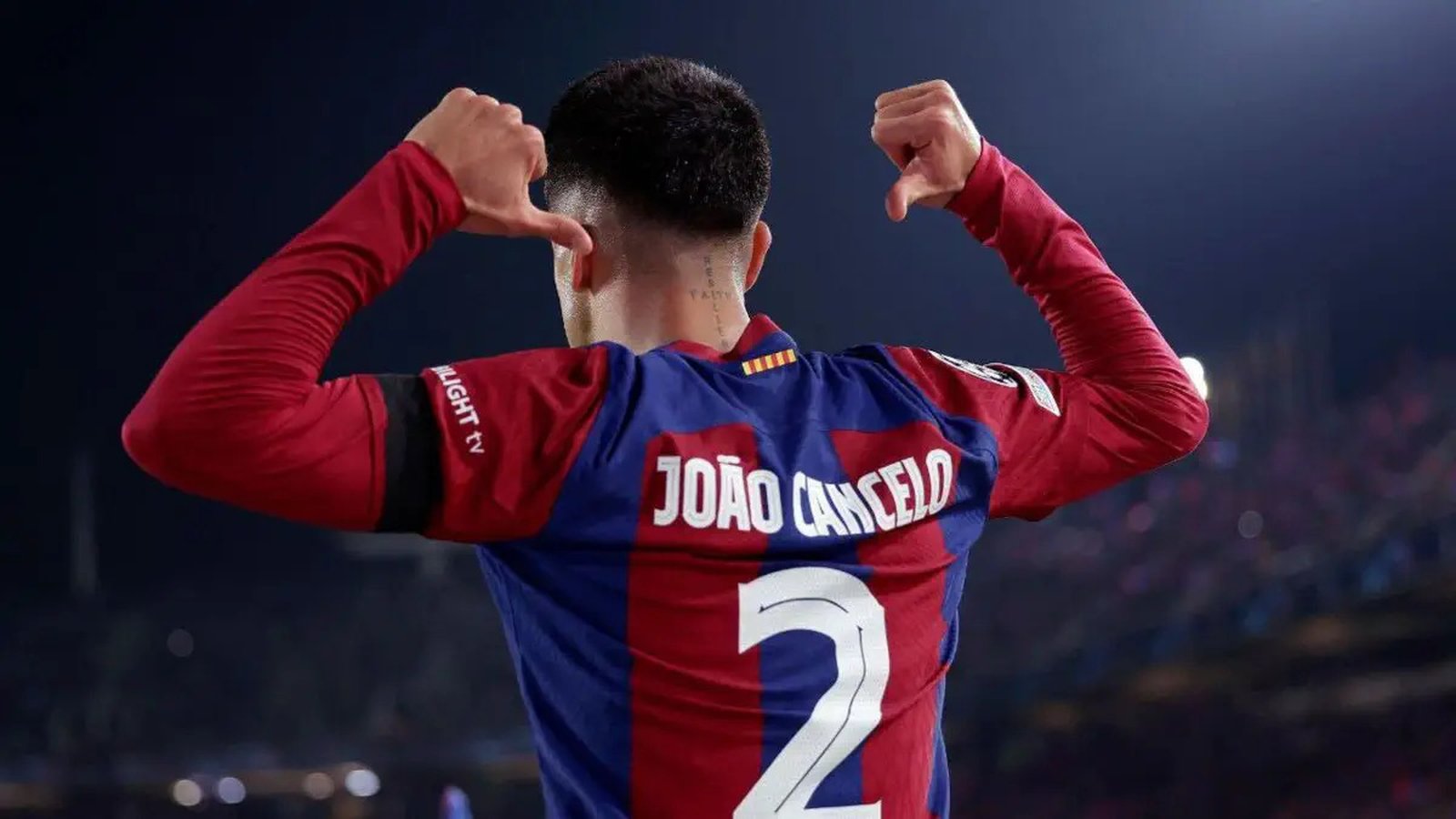 João Cancelo in Barcelona kit