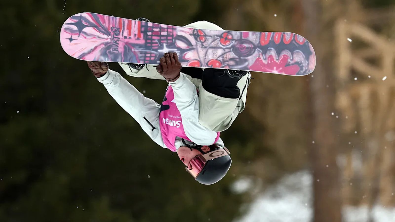 Snowboarder performing aerial trick