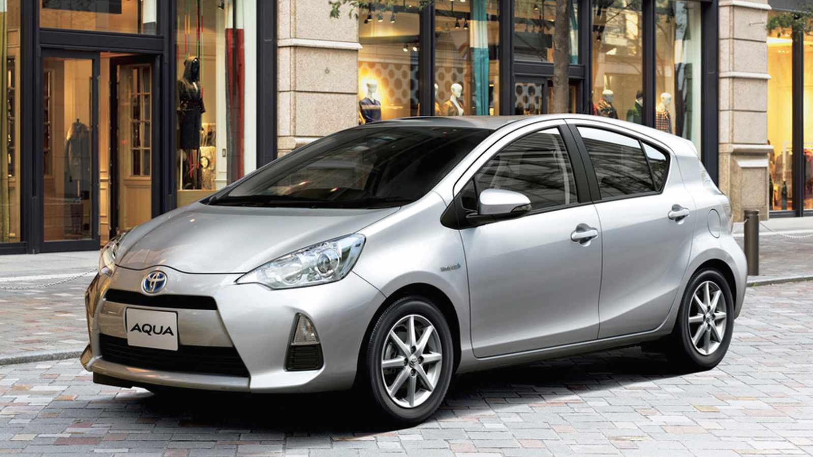 Toyota Aqua hatchback parked on a street