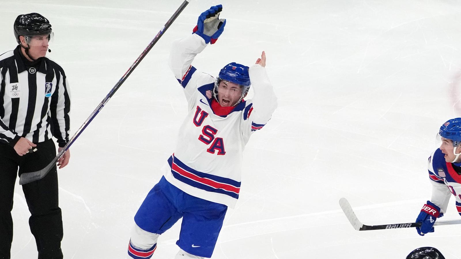 Hockey player Zach Werenski with Olympic gold medal