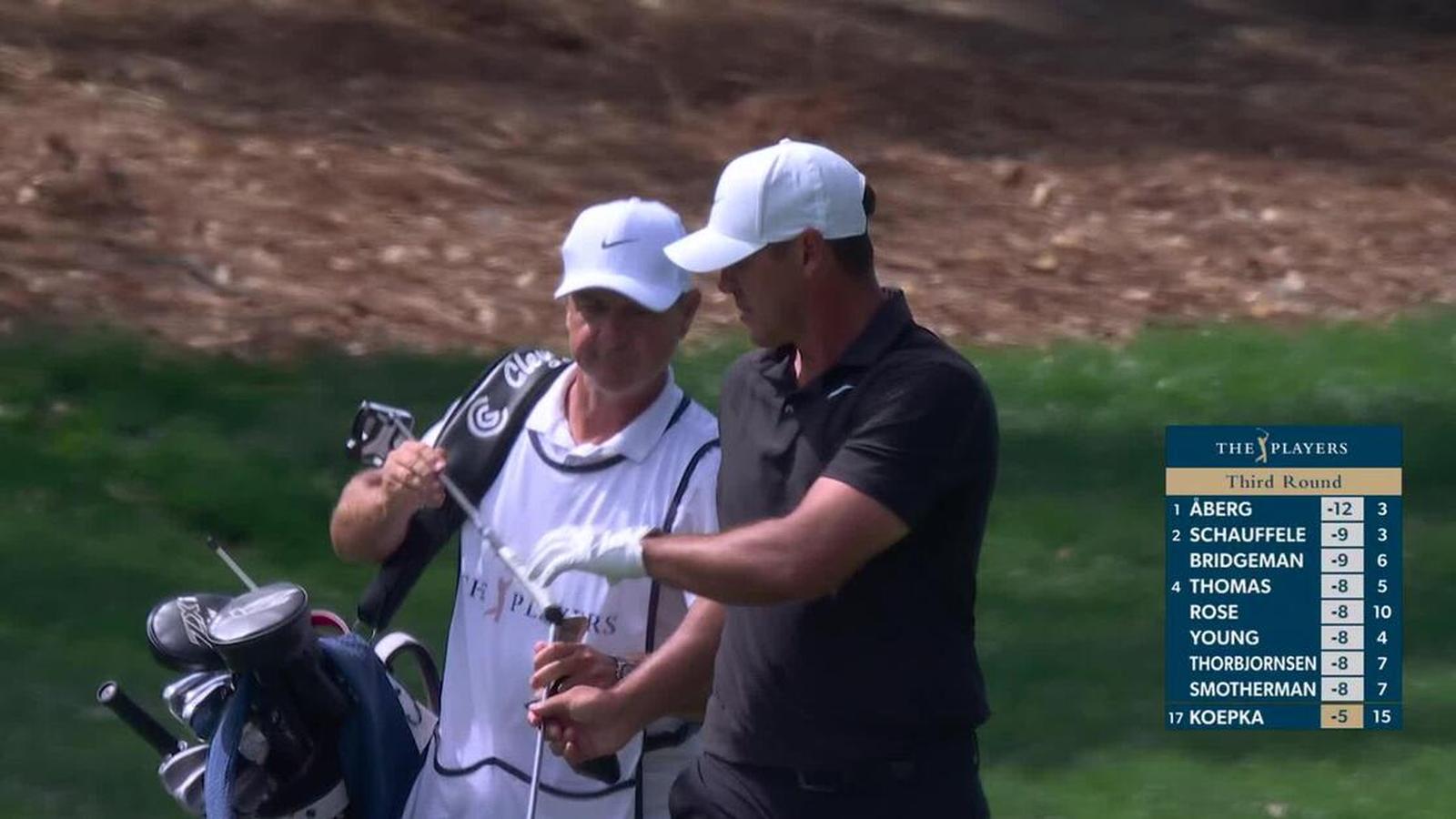 Brooks Koepka golfing on course