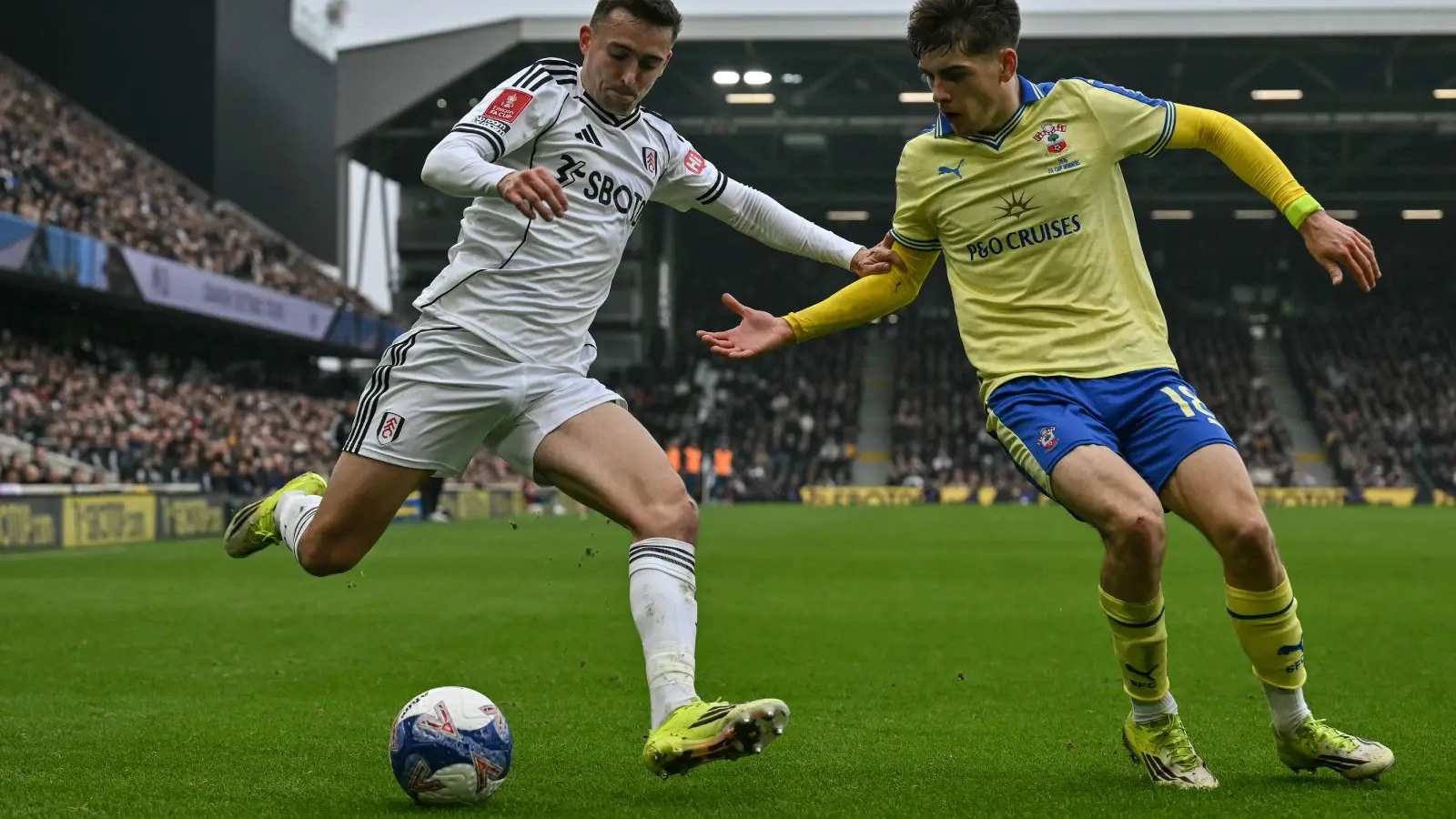 Footballers competing in FA Cup match