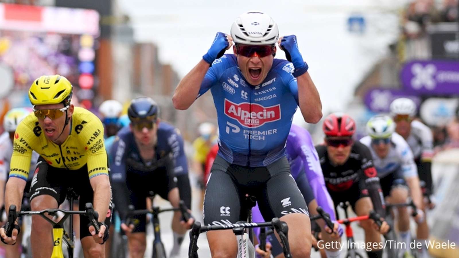 Jasper Philipsen cycling on cobblestones