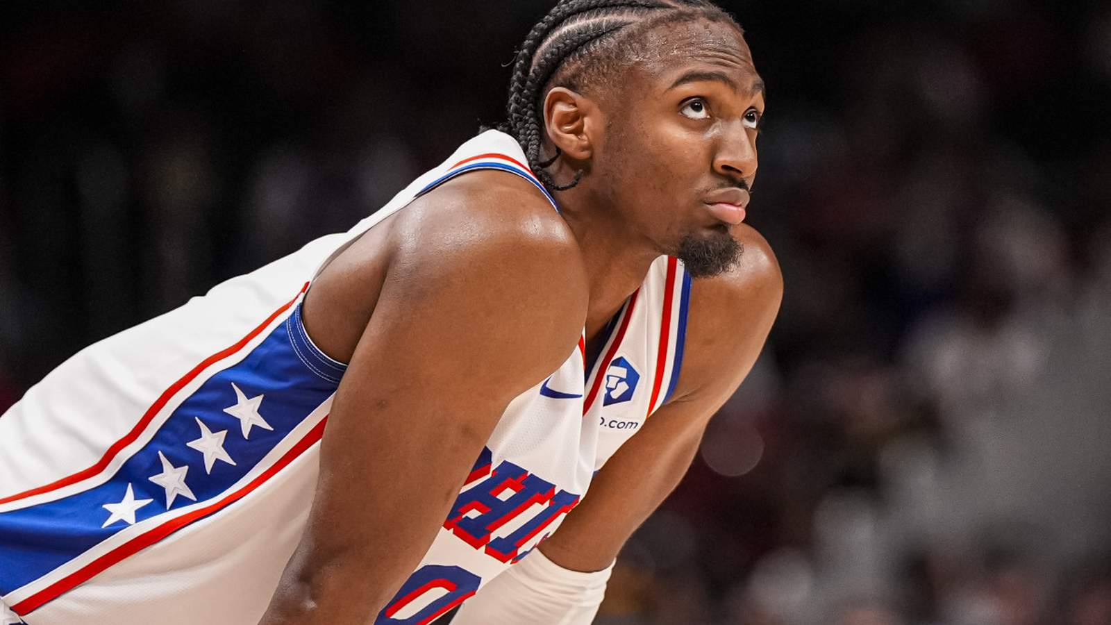 Joel Embiid sitting on the bench