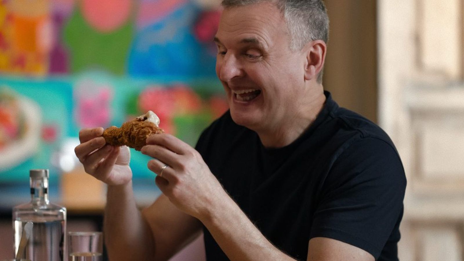Phil Rosenthal smiling at camera
