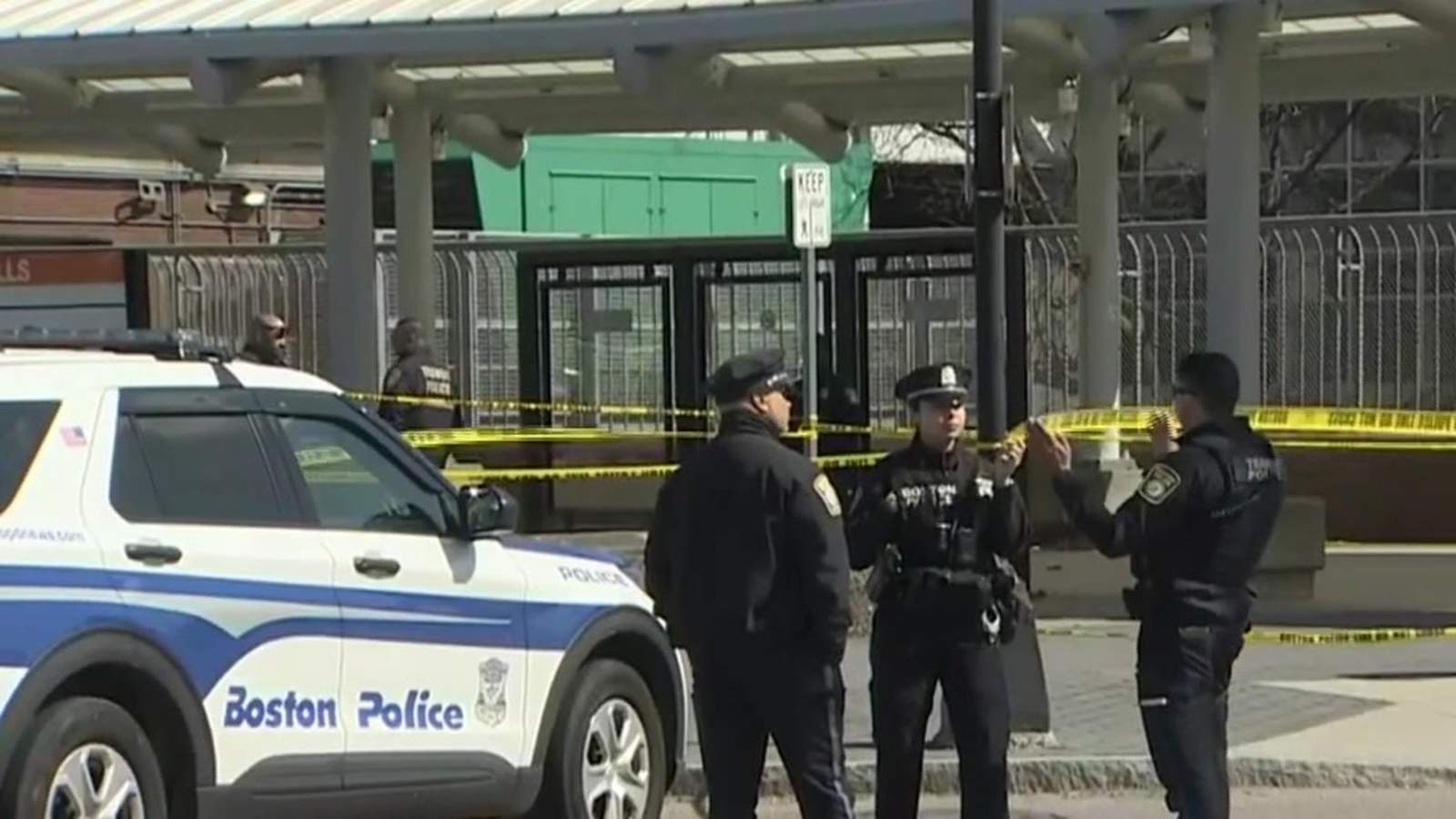 Police tape blocking off transit station entrance