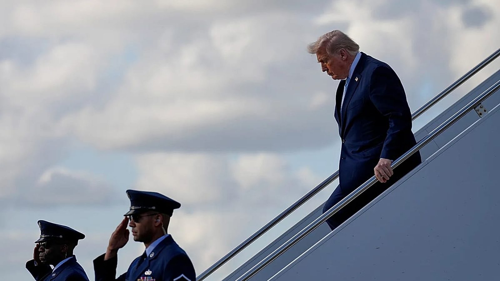 US President Donald Trump speaking at podium
