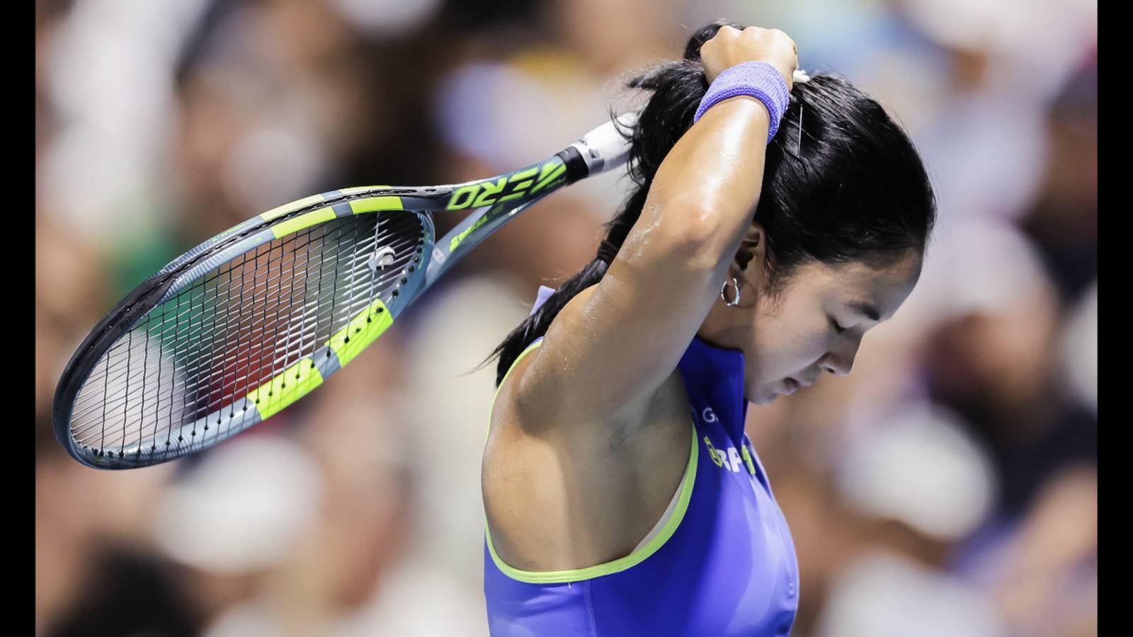Alex Eala playing tennis match