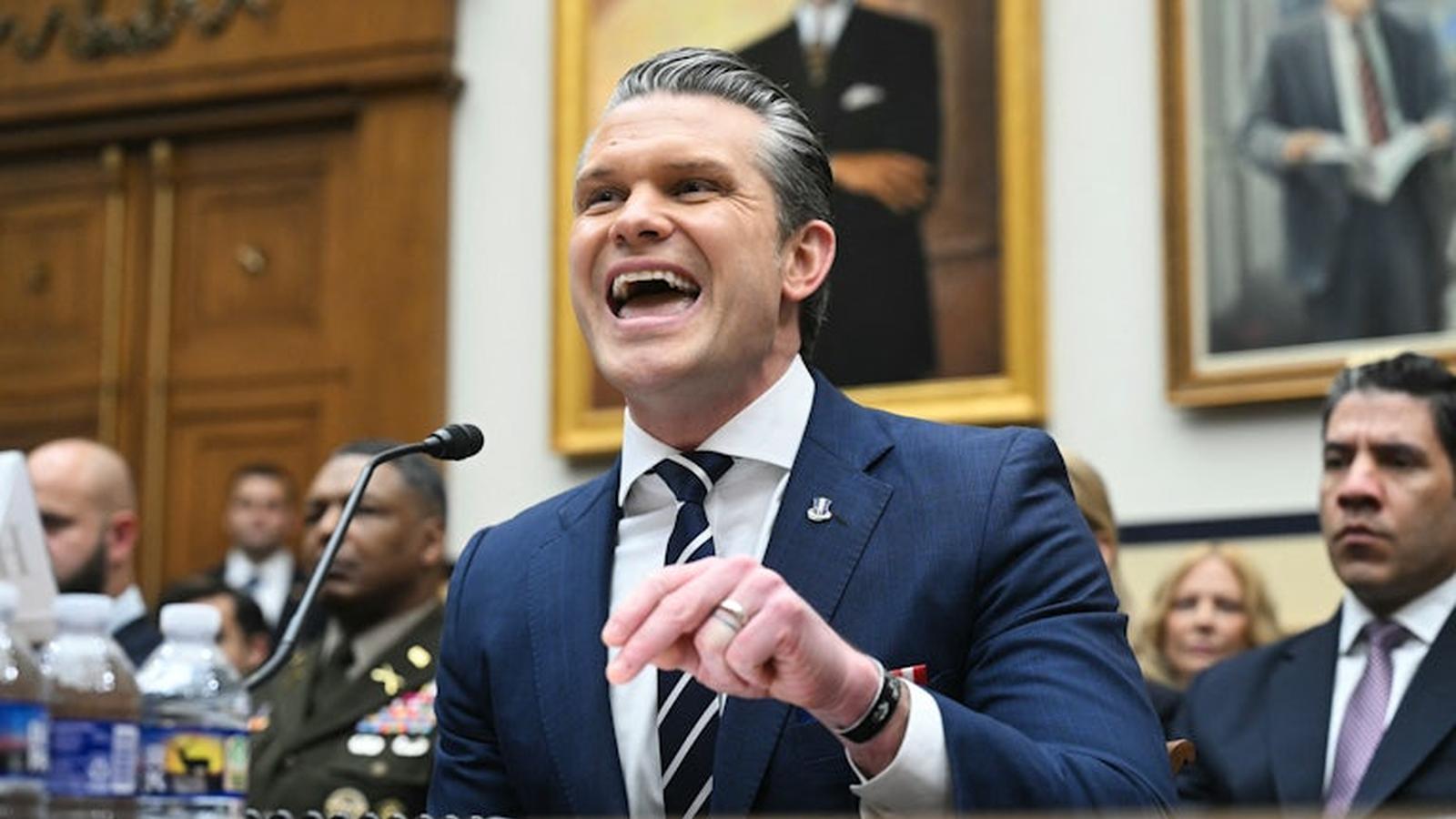 Defense Secretary Pete Hegseth speaking passionately during a House Armed Services Committee hearing