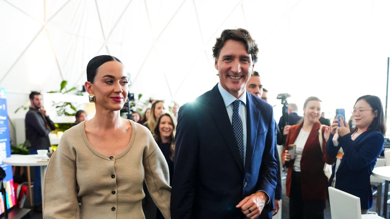 Katy Perry and Justin Trudeau walking together at the Coachella music festival event