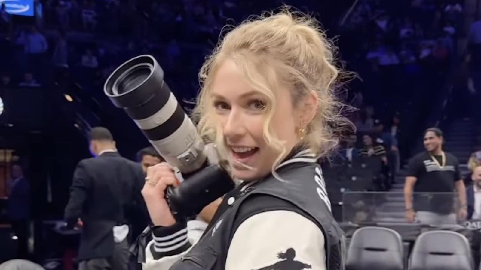 Mikaela Shiffrin holding professional camera