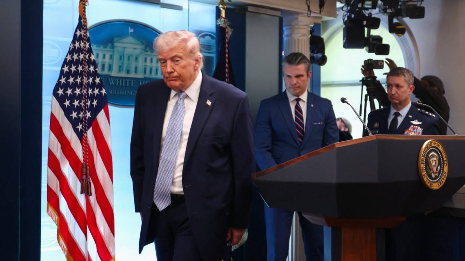 President Donald Trump speaking at a podium