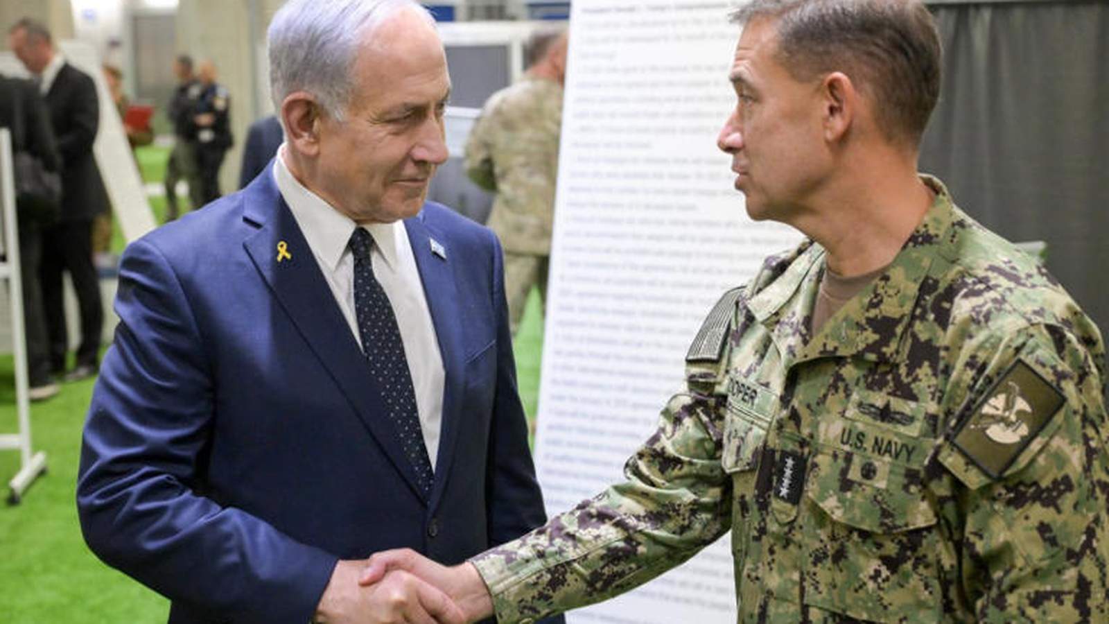 US Navy Admiral Brad Cooper shaking hands with Israeli Prime Minister Benjamin Netanyahu