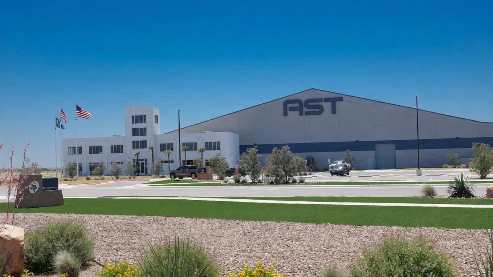 The exterior of the AST SpaceMobile corporate building with company branding under clear skies