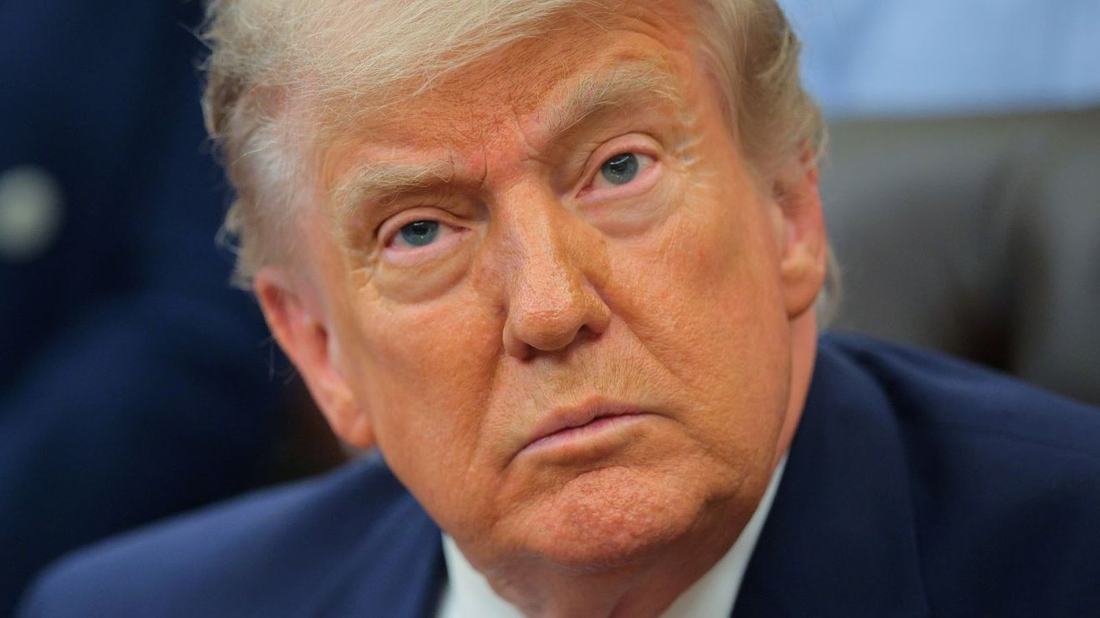 Close up portrait of Donald Trump looking forward during a campaign event appearance