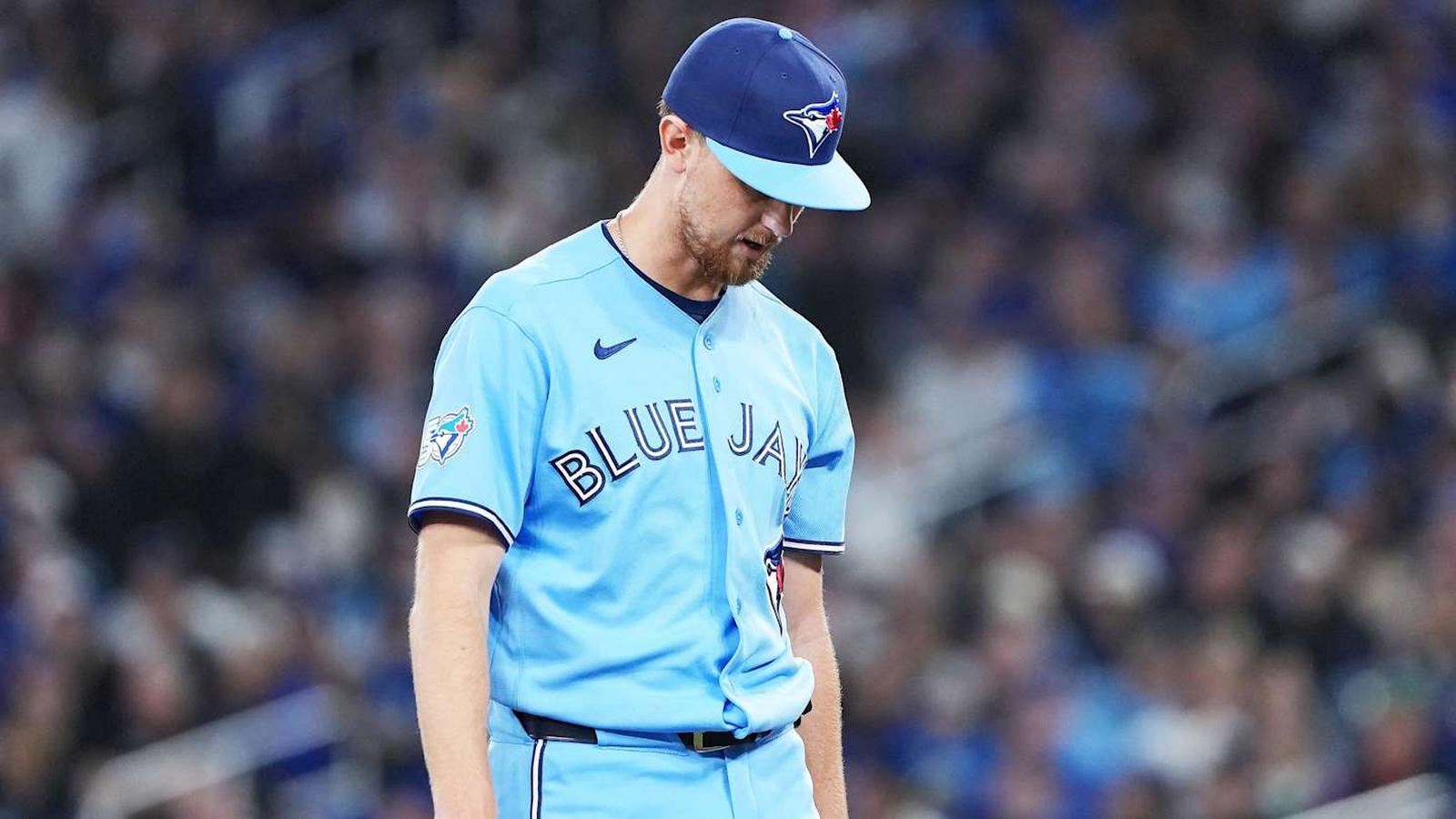 Toronto Blue Jays pitcher Eric Lauer looking down while wearing a light blue jersey