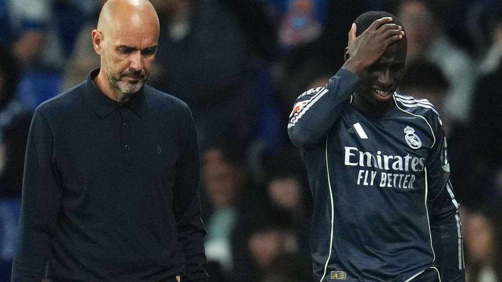 Real Madrid player Ferland Mendy looking distressed with his hand on his head