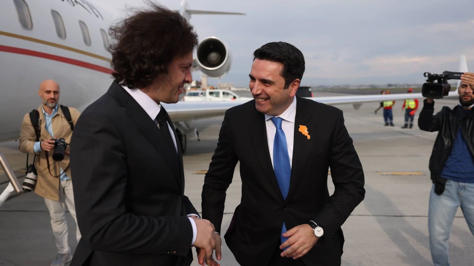 Georgian Prime Minister Irakli Kobakhidze is greeted by Alen Simonyan at Zvartnots Airport