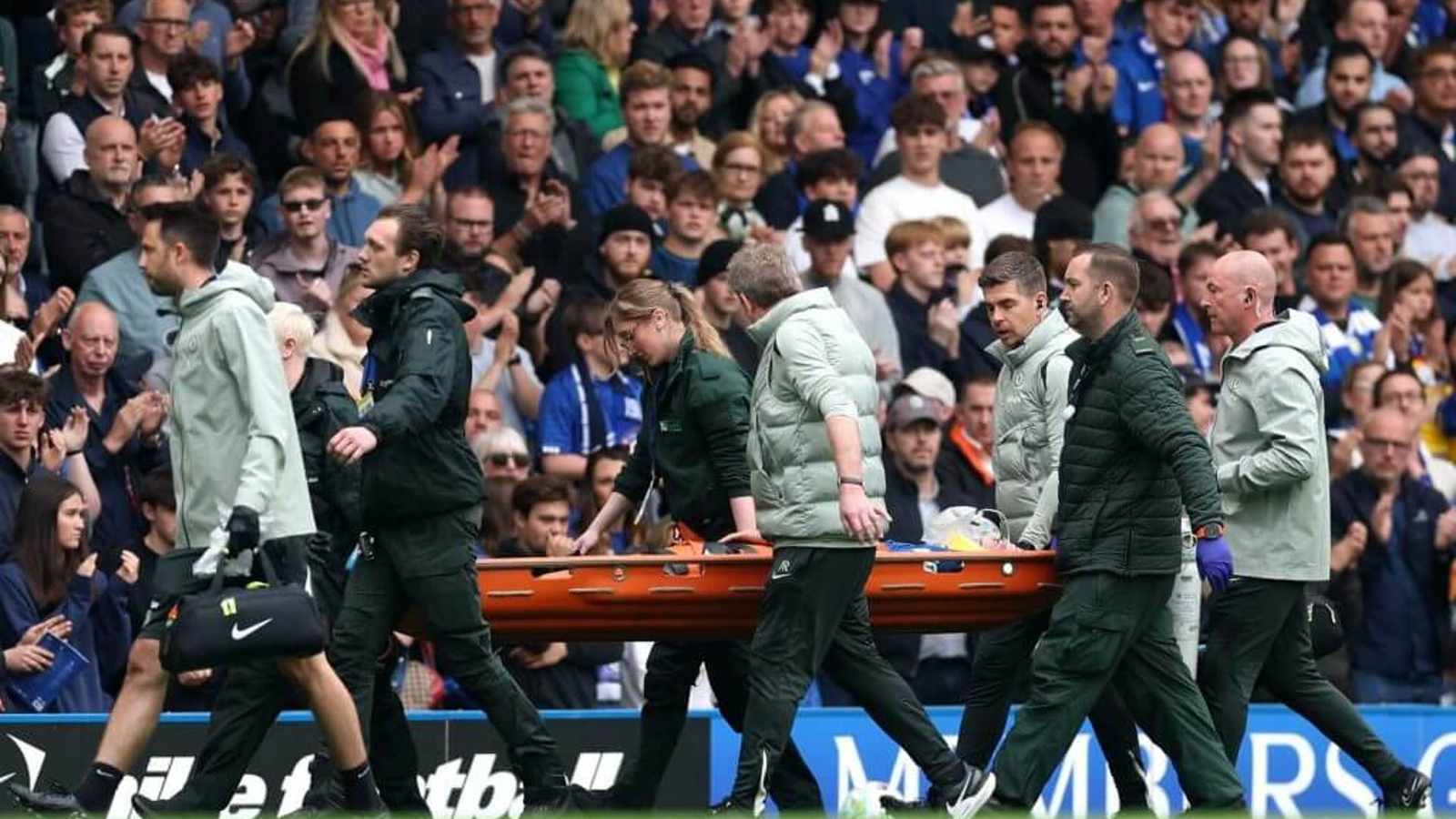 Jesse Derry being stretchered off field