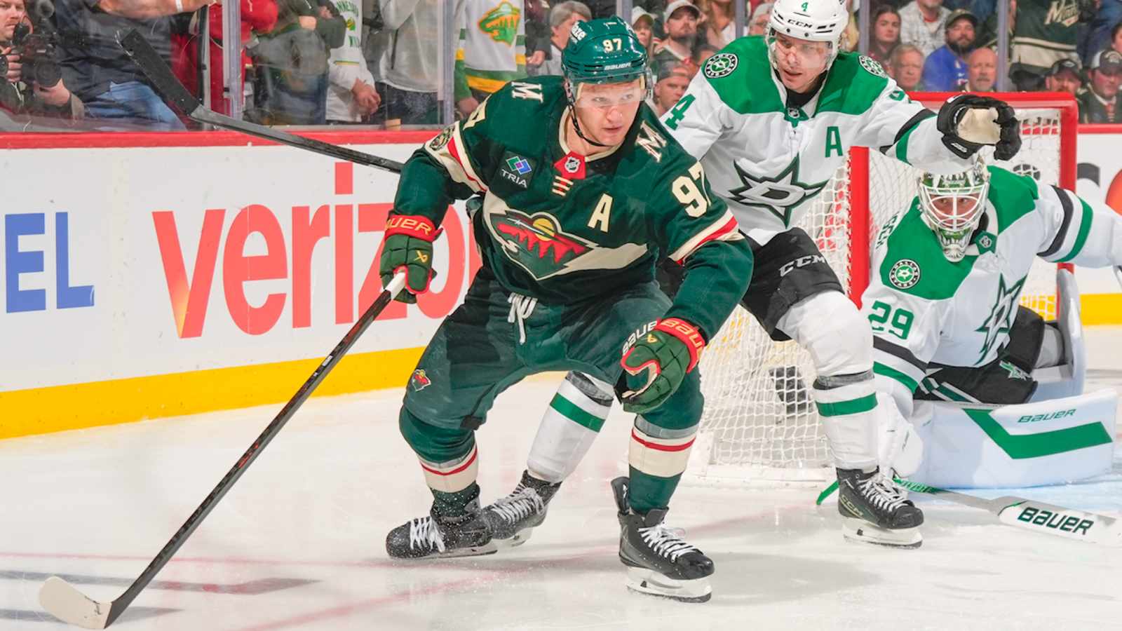 Minnesota Wild forward Kirill Kaprizov skates with the puck near the Dallas Stars goal