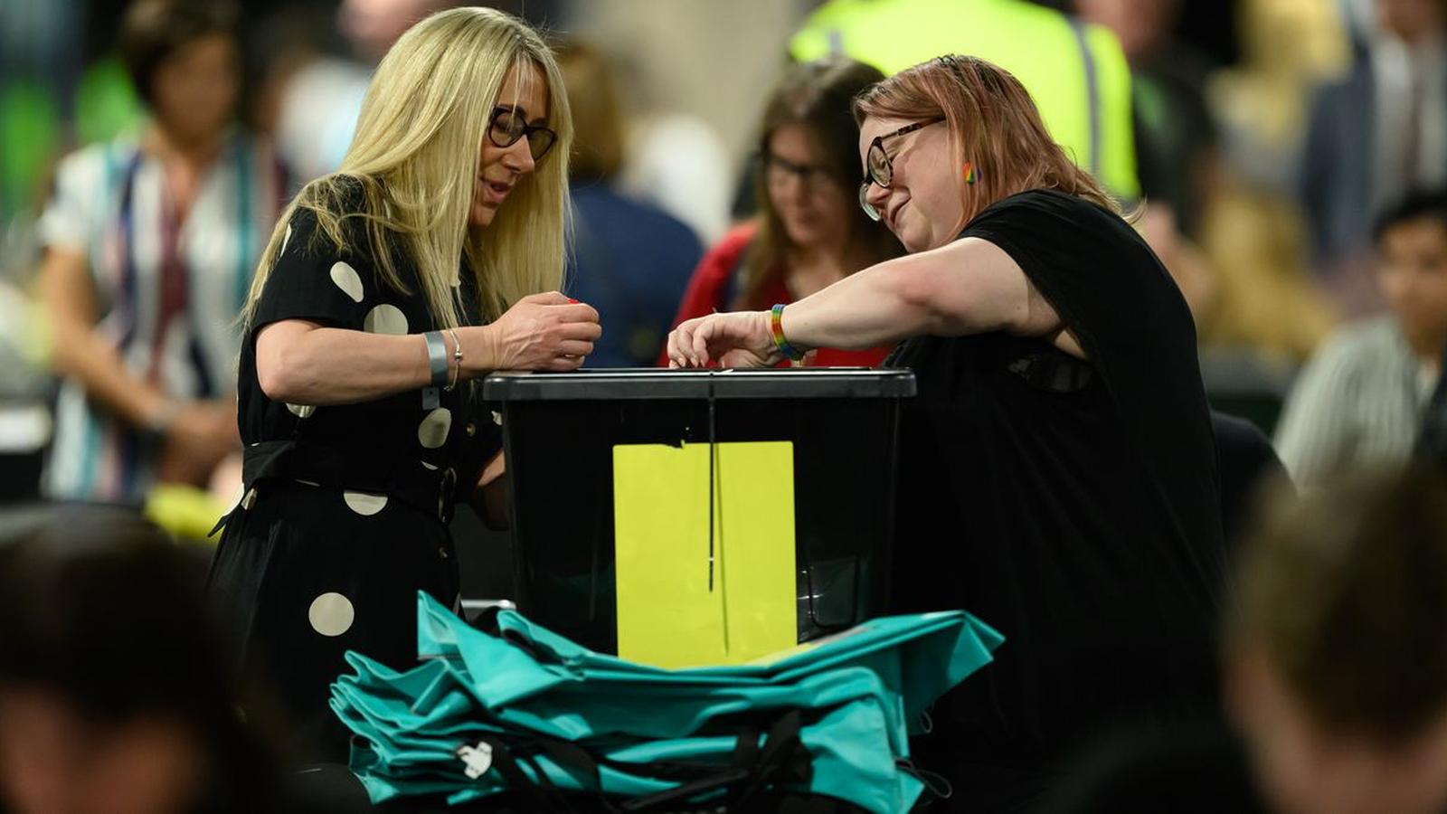 Election officials counting ballots for Leeds local elections