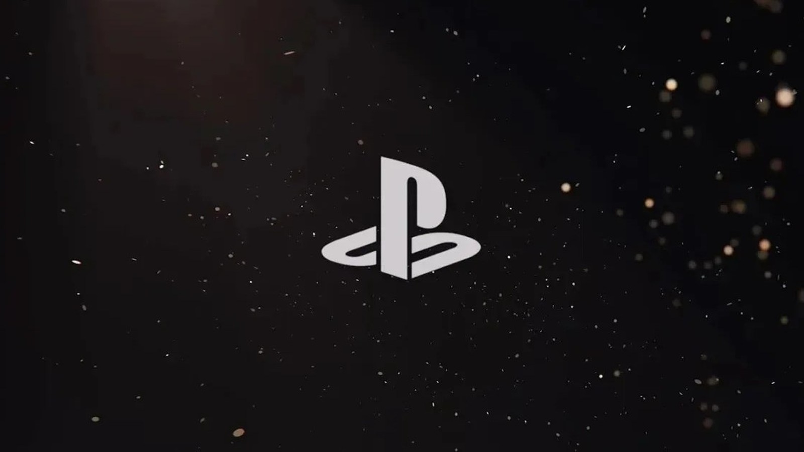 The iconic white PlayStation logo centered against a dark background with floating particles