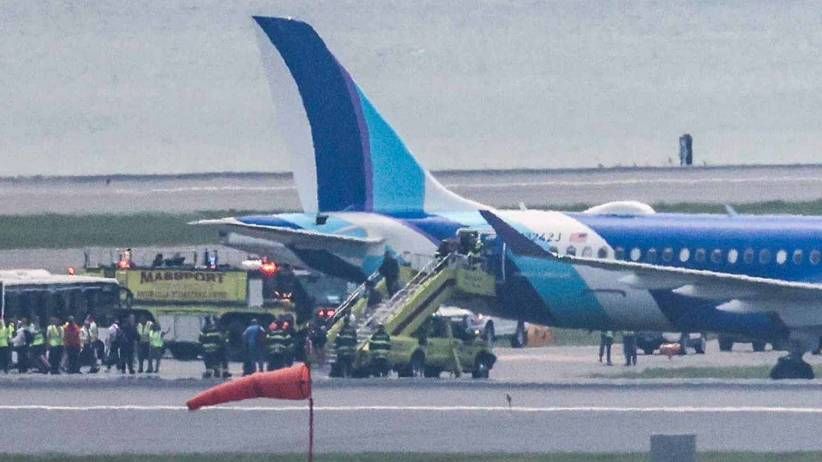 JetBlue Plane Skids Off Runway at Boston Logan Airport