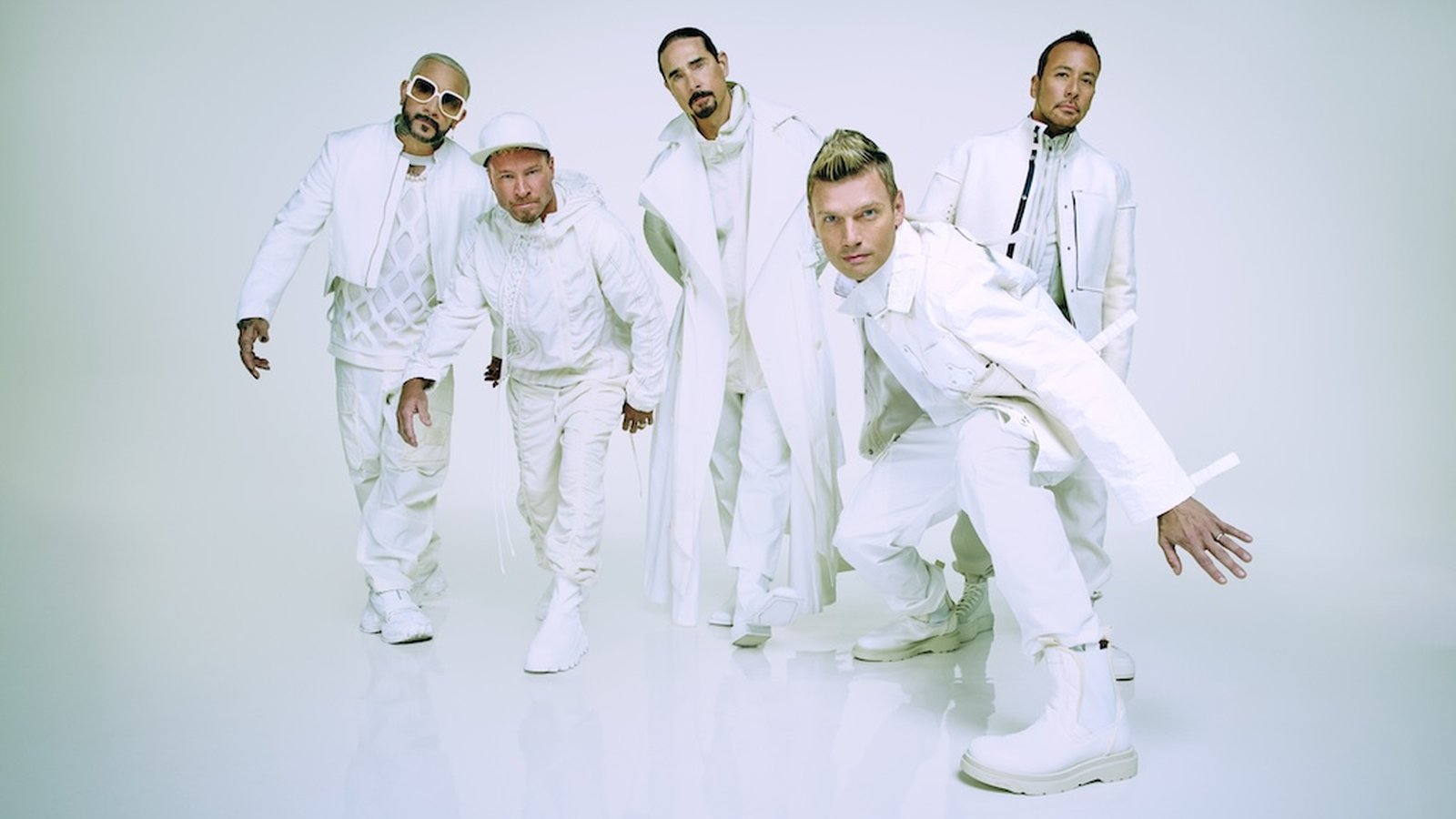The Backstreet Boys have launched their high-tech Las Vegas Sphere residency, 'Into the Millennium,' alongside a nostalgic immersive fan pop-up experience, solidifying their legacy as boy band icons.