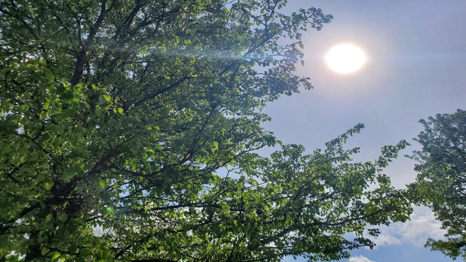 Canadian wildfire smoke and ground-level ozone continue to impact air quality across the U.S., with alerts issued for sensitive groups and rising temperatures exacerbating the situation.