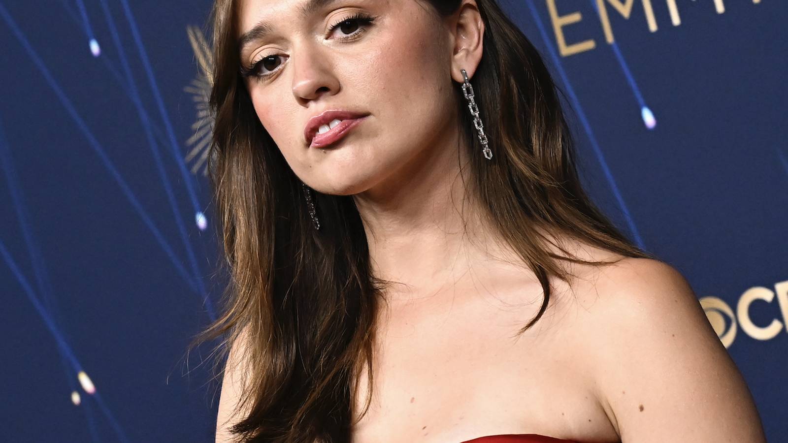 Aimee Lou Wood turned heads at the 2025 Emmys with her stunning Alexander McQueen gown, while also making a bold statement with her Artists4Ceasefire pin.