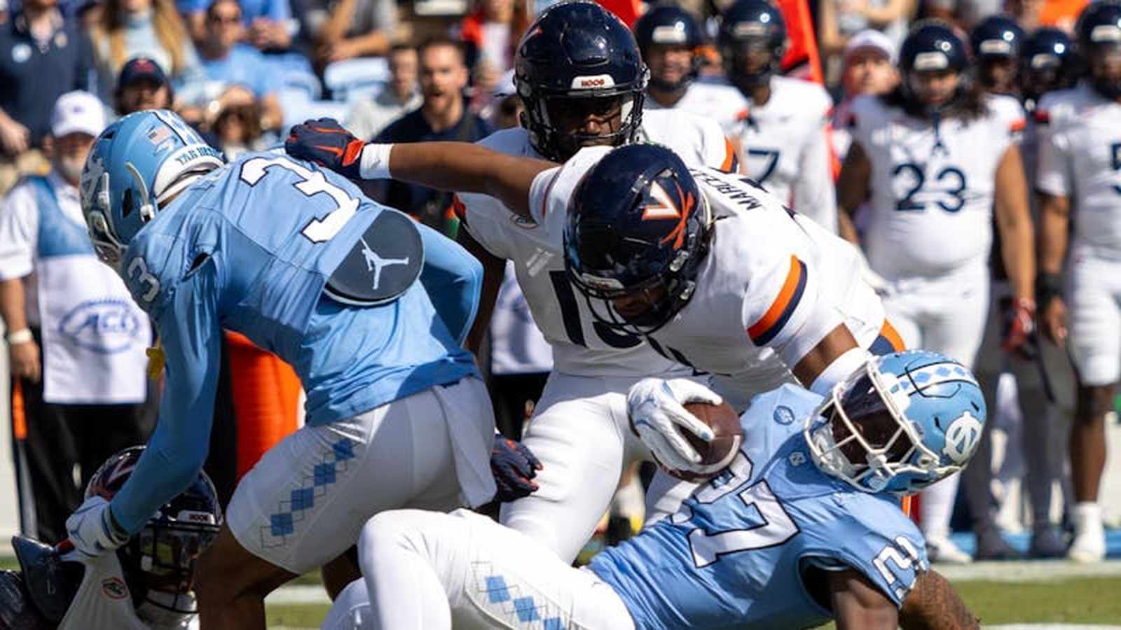 North Carolina was rocked by drama both on and off the field this weekend: Virginia edged UNC in overtime, while a mass shooting at a Maxton party left two dead and several wounded.