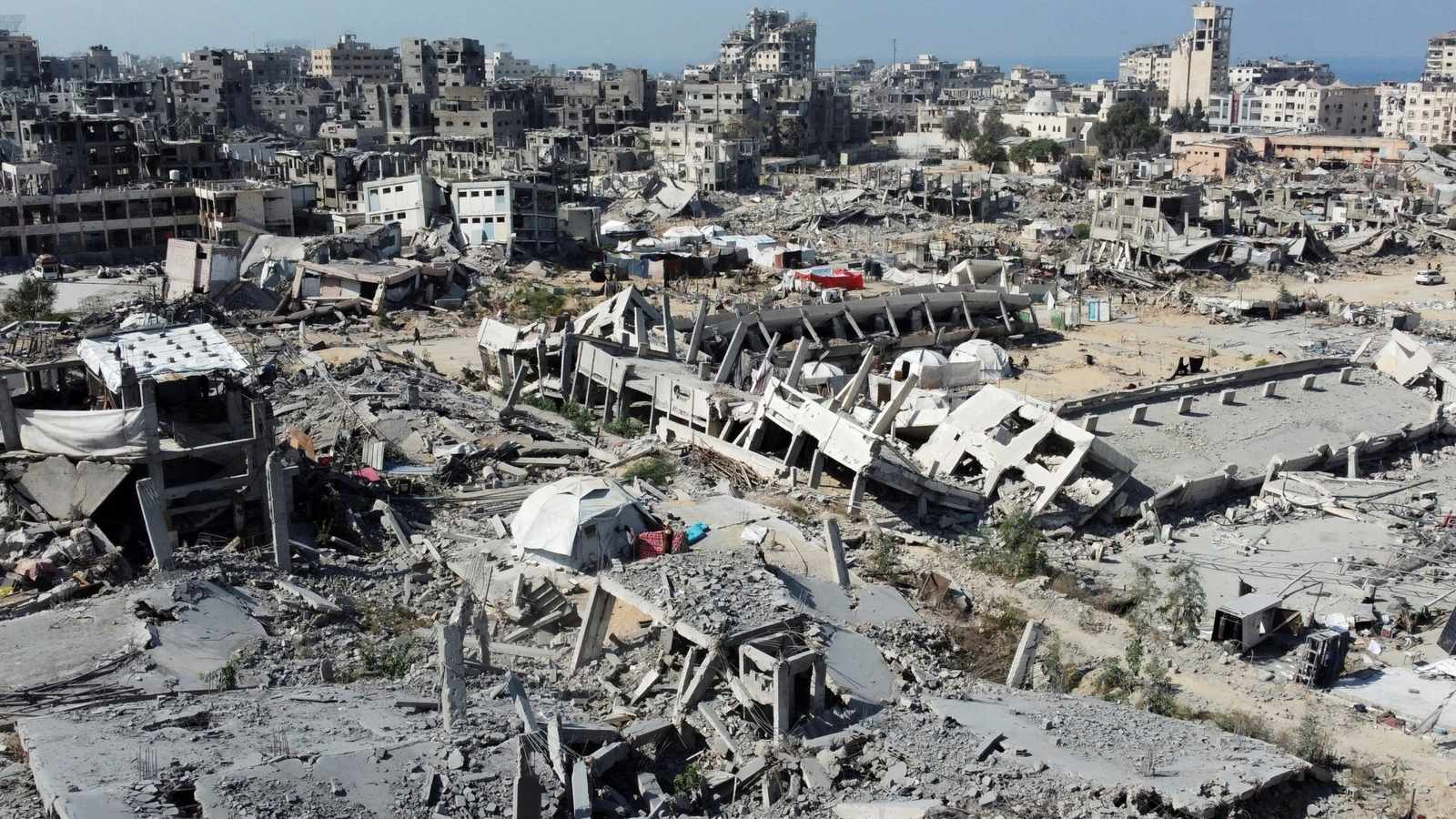 Israeli airstrikes rocked southern Gaza as both Israel and Hamas traded accusations over ceasefire breaches, halting vital humanitarian aid and stirring fear of renewed conflict.