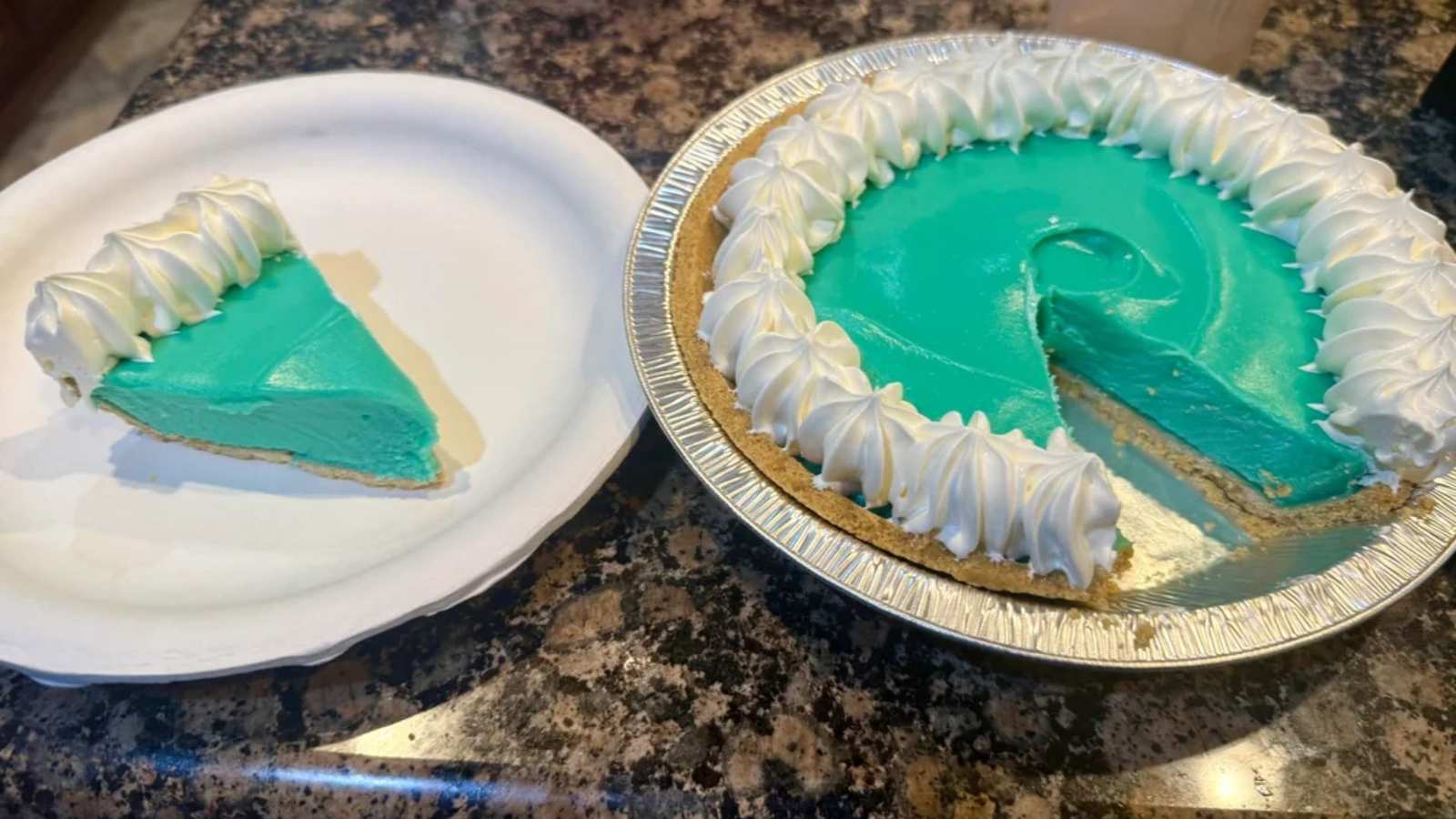 Taco Bell's Mountain Dew Baja Blast Pie is a limited-time dessert reimagining the iconic soda flavor as a key lime-style pie. Explore its creation, availability, and fan reactions.