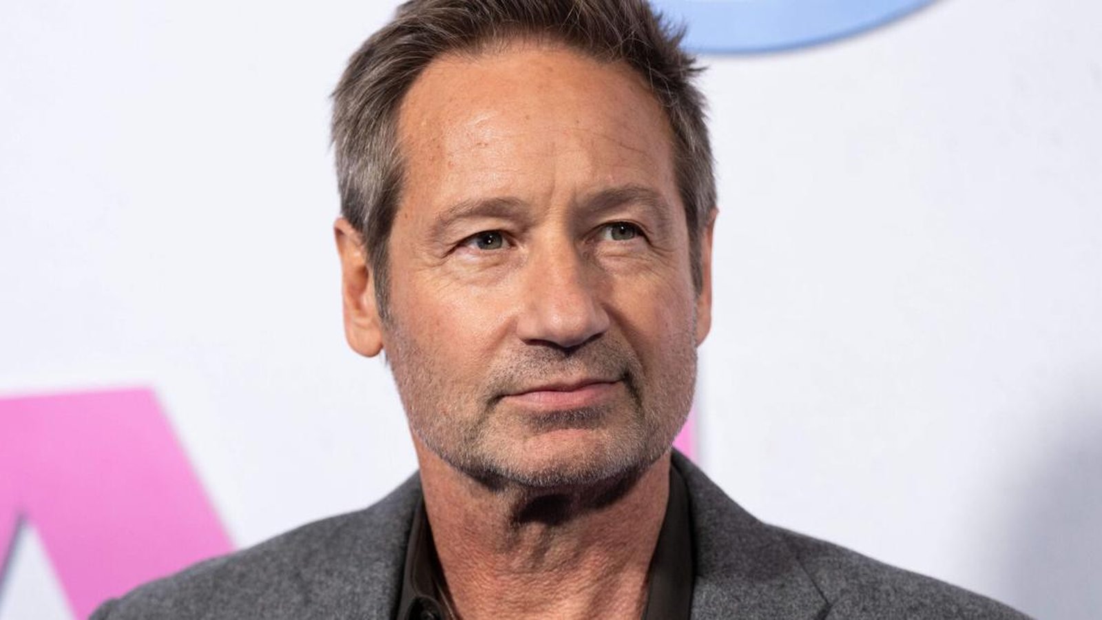 David Duchovny drew crowds and critical acclaim at the Britain world premiere of 'Malice', signaling a major cinematic event and enthusiastic fan turnout.
