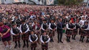 Gerard Butler Celebrates with Melbourne Pipers as AC/DC World Record Falls