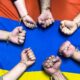 fists and Armenian flag