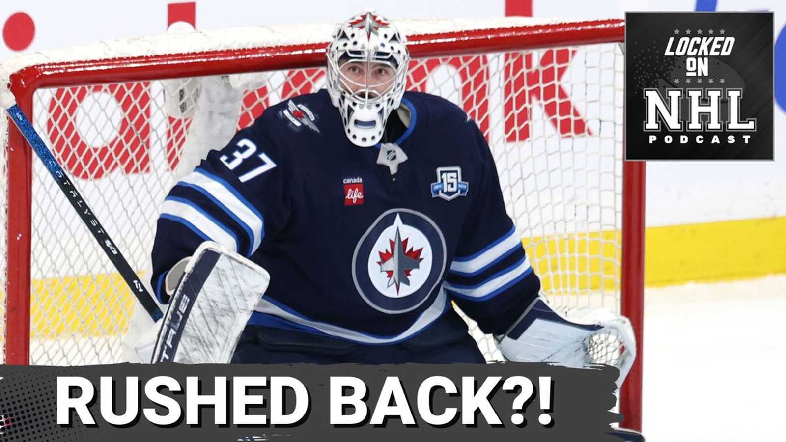 Connor Hellebuyck in Jets uniform