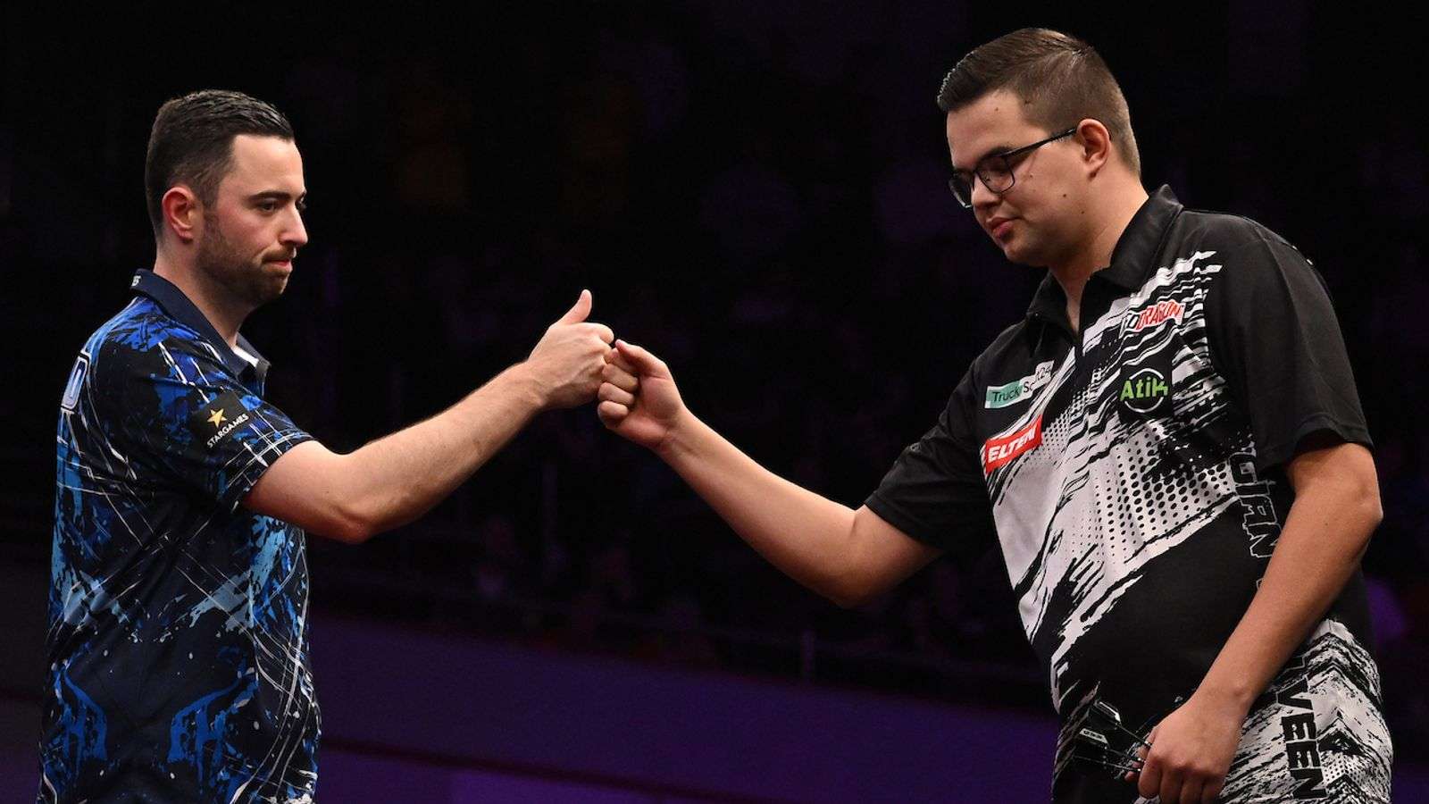 Darts players at oche