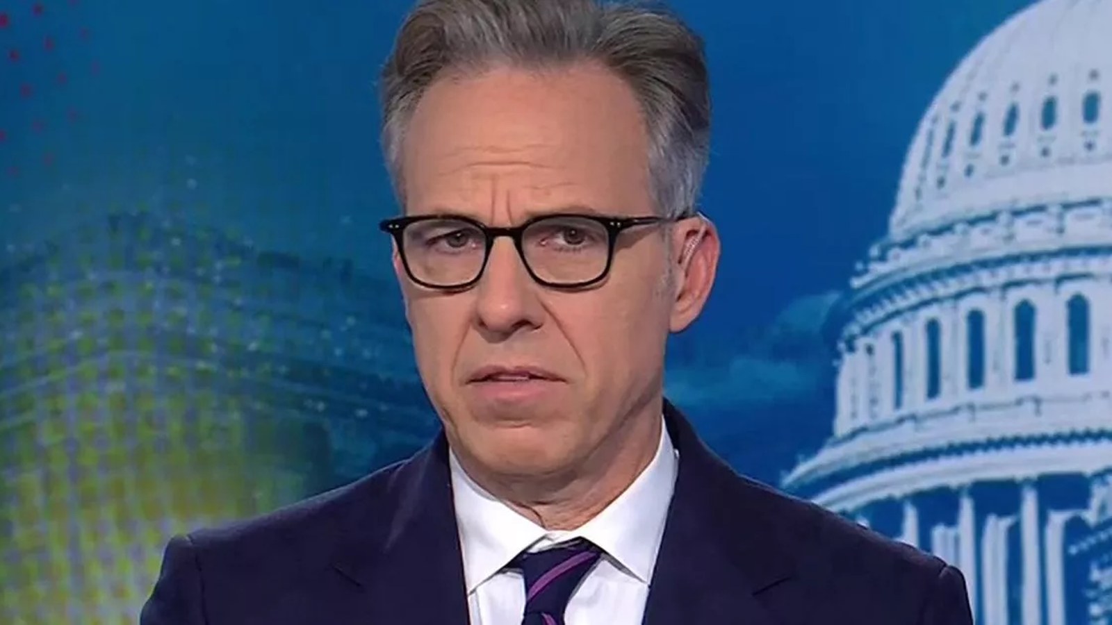 CNN anchor Jake Tapper drew criticism after mistakenly identifying the January 6 pipe bomb suspect’s race on live televi