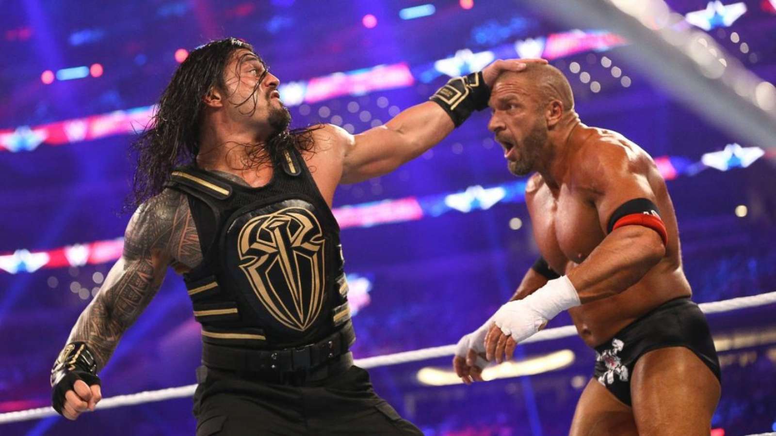 Roman Reigns vs Triple H