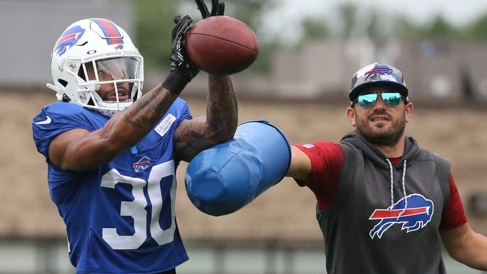 NFL coach Bobby Babich on field