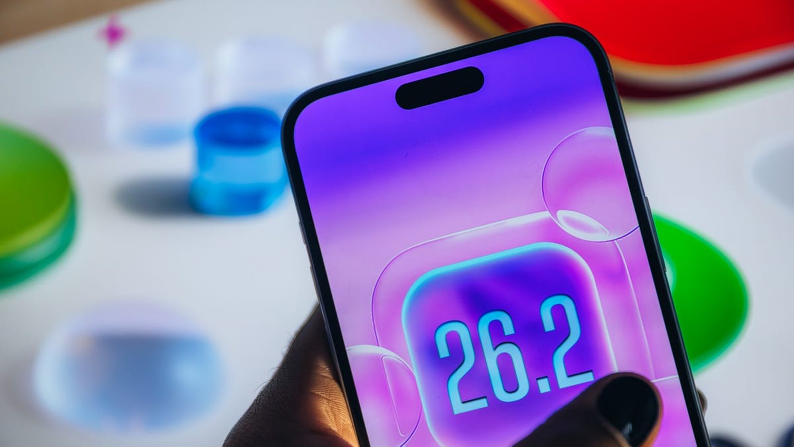 iPhone displaying iOS 26.2 update screen