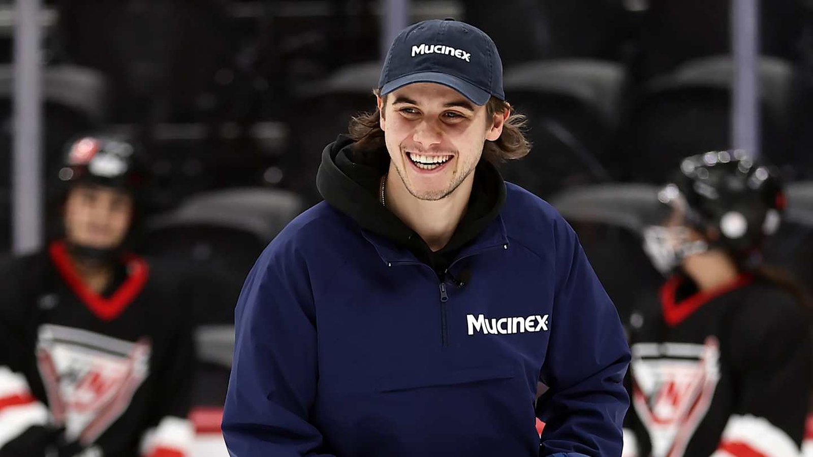 Jack Hughes playing ice hockey