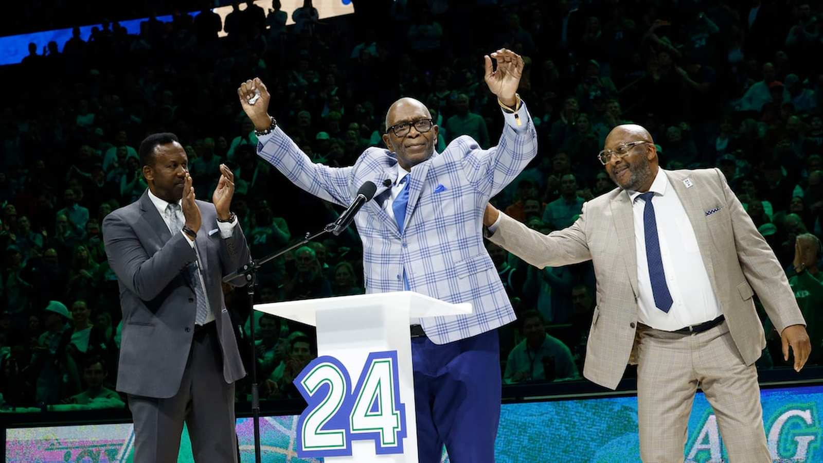 Mark Aguirre 24 jersey raised