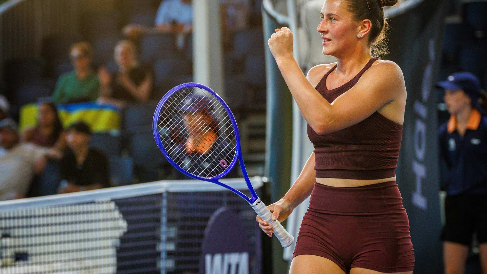 Marta Kostyuk playing tennis